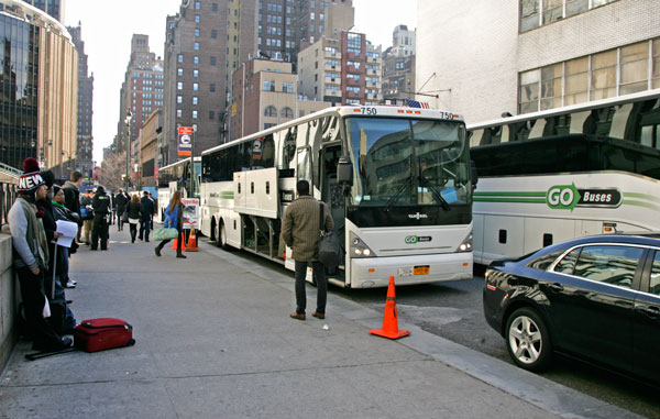 CB4 Wants DOT to Rethink 31st St. Bus Stop 1 Photo by Sam Spokony Three Go Buses cram into the 70-foot terminal on W. 31st St., near Eighth Ave., on the morning of Nov. 30. A DOT proposal would place an additional intercity bus company at that site.
