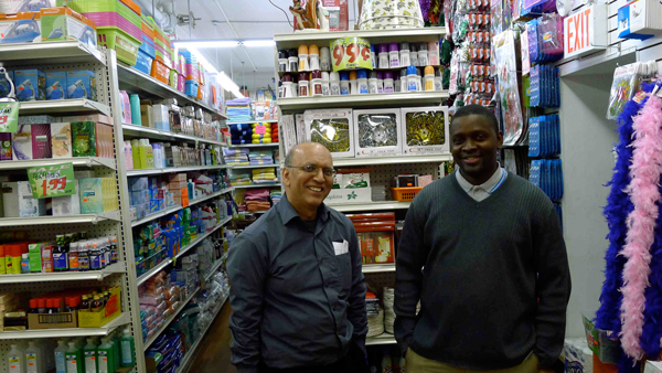 99 Cents Creation Returns, but Struggles in New Location 1 Photo by Heather Dubin Back in business: 99 Cents Creation owner Afsar Khan, left, and General Manager Mamdou Diaman.