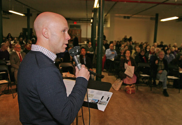 Preservationist Andrew Berman spoke at Wednesday’s meeting about the Hudson River Park air rights bill. Minutes later, he informed the crowd the bill had been signed into law.   Photo by Sam Spokony