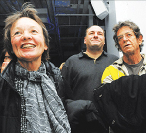 Downtown Express file photo Lou Reed, right, with his wife, Laurie Anderson, left, and James Gandolfini, center, were among the celebrities at a March 2009 fundraiser to oppose the city’s three-district Sanitation garage in Hudson Square.