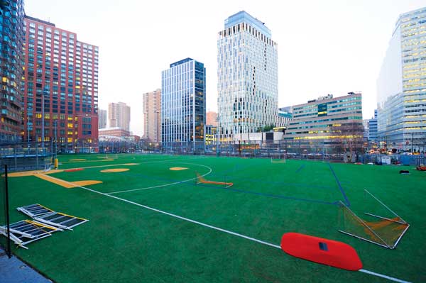 The Battery Park City ball fields as they looked Tuesday. The Battery Park City Authority has announced that the artificial turf will have to be entirely replaced because of damage from Superstorm Sandy.  Downtown Express photo by Terese Loeb Kreuzer