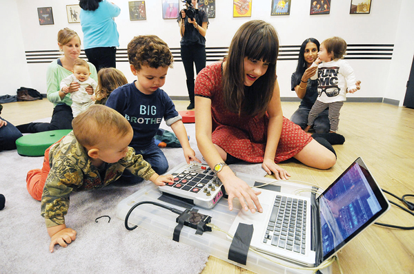 Oh, baby! You can’t get any fresher than these DJ’s 4 Babies and Natalie Weiss get down to the business of beats at the Baby DJ School. Photos by Jonathan Alpeyrie