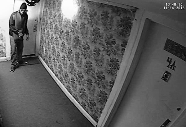 Surveillance camera image of alleged burglary suspect, provided by police.