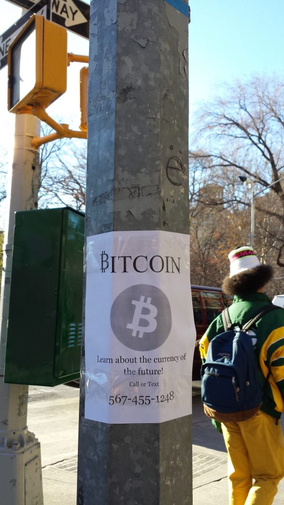 Signs about bitcoins recently were posted around Washington Square.  Photo by Lincoln Anderson