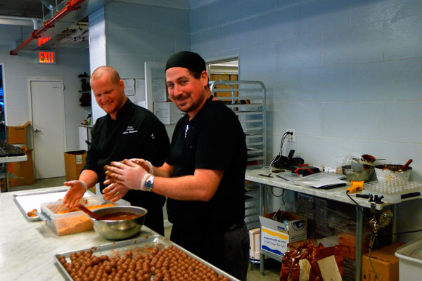 A chocolatier’s sweet dreams come true in Tribeca 1 Hakan Martensson, left, and Joav Hak, from Israel, rolling truffles by hand at Fika in Tribeca. Photo by Heather Dubin