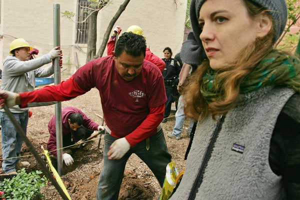 Building plans move forward on garden lot 1 Downtown Express photo by Sam Spokony In May, Kate Temple-West, C.M.G. director, right, watched in dismay as workers fenced off the privately owned parcel.