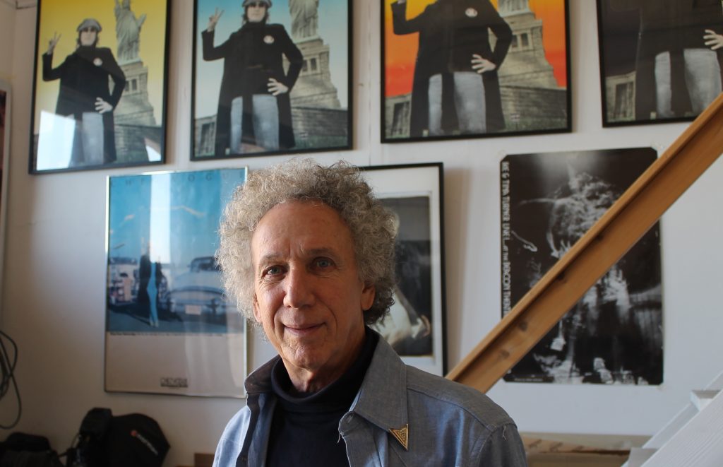 Bob Gruen in his Westbeth studio in front of silkscreen color prints of one of his famous photos of John Lennon.  Photo by Lincoln Anderson