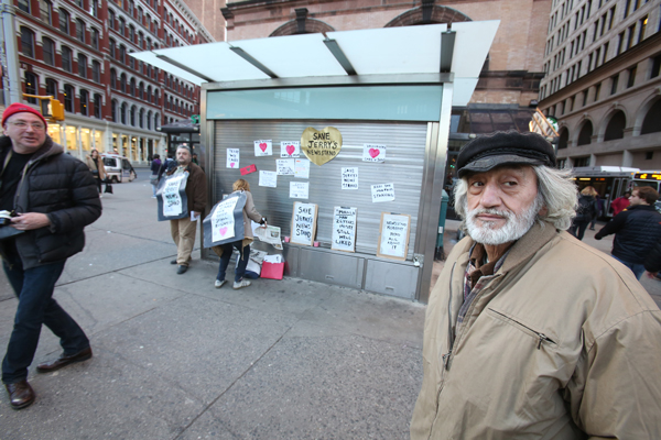 Jerry Delakas, above, and top center, at Saturday’s rally outside his closed Astor Place newsstand.  Photos by Jefferson Siegel