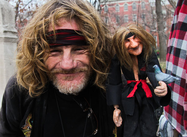 Larry Reddick, a.k.a. “The Bird Guy,” is one of the denizens of Washington Square Park’s west side. Frequently festooned with pigeons, Reddick hangs out near where Ricky Syers brings his marionettes, Mr. Stix and “Little Doris” — a miniature version of veteran Community Board 2 member Doris Diether — to enchant passersby. Now “Little Larry” is the newest member of Syers’s marionette family. “I used to be homeless living on that bench,” Reddick said recently, pointing to his regular spot. “I have an apartment in Brooklyn now.”  Photo by TEQUILA MINSKY