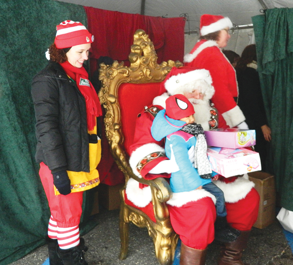 Santa, bobcat and a Ho! Ho! whole lot of toys! 4 Photos courtesy N.Y.U.