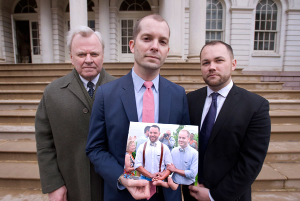Photo by Photo by William Alatriste/New York City Council Javier Morgado (center), former Fire Commissioner Thomas Von Essen and Councilmember Corey Johnson (right) gather at City Hall to advocate for better emergency protocols in high-rise buildings.