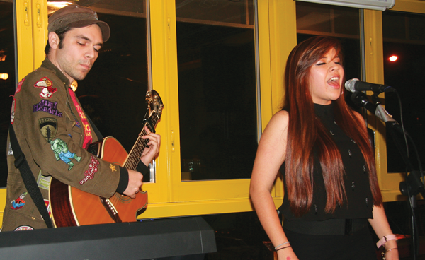 Pop-folk musicians Orlando and Elia, at Bareburger.   PHOTO BY MICHAEL LYDON