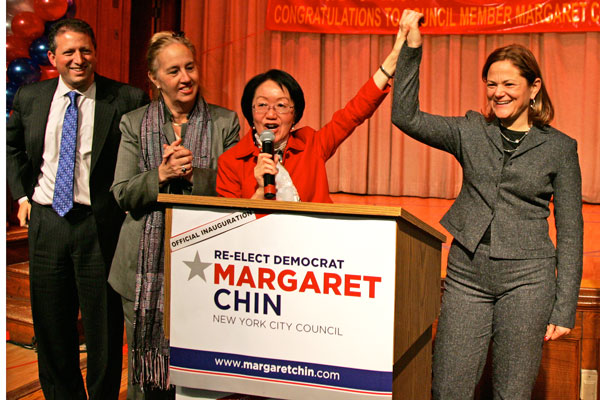 Powerful come out to celebrate Chin’s second term 1 Downtown Express photo by Sam Spokony. Councilmember Chin raised her hand with Councilmember Melissa Mark-Viverito, right, at Chin’s swearing in ceremony Jan. 5. At left is Councilmember Brad Lander and Borough President Gale Brewer.