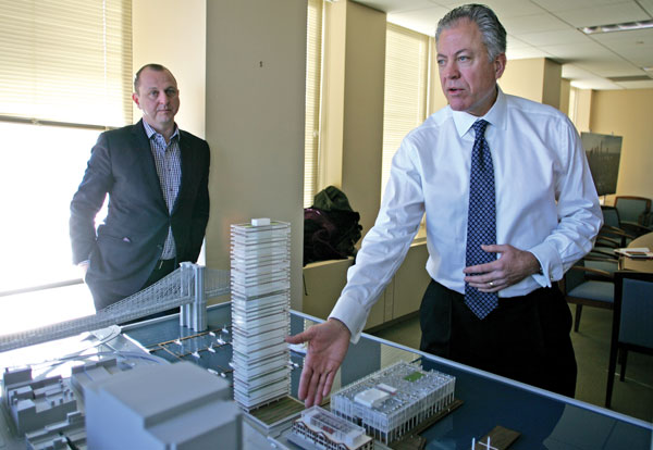 Downtown Express photo by Sam Spokony Howard Hughes Corp. executive Chris Curry explains the project as Gregg Pasquarelli, the lead architect, looks on.   