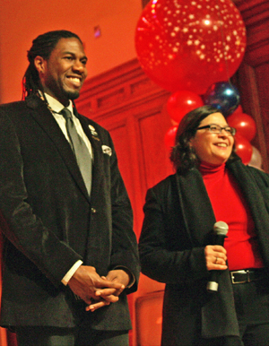 Councilmembers Jumaane Williams, left, and Rosie Mendez were all smiles on stage together at Councilmember Margaret Chin’s inauguration last Sunday.  Photo by scoopy