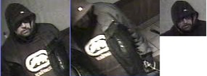 An image, provided by police, of the suspect in a gunpoint robbery of a Starbucks.