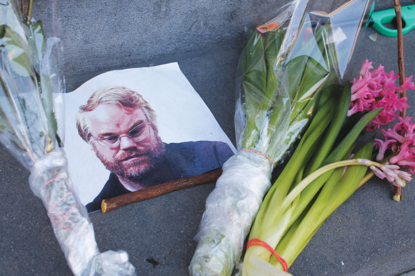 Another photo of Philip Seymour Hoffman left at a memorial to him outside 35 Bethune St.   Photo by Lincoln Anderson