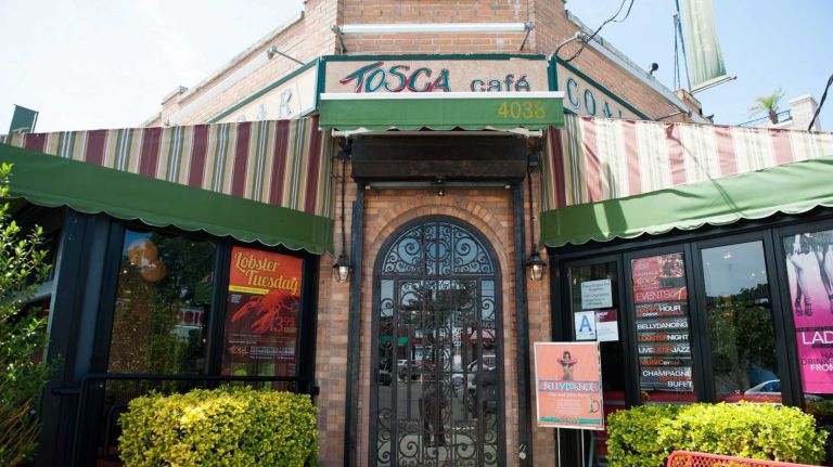 Tosca Cafe is located on the corner of E. Tremont Avenue and Miles Avenue. 