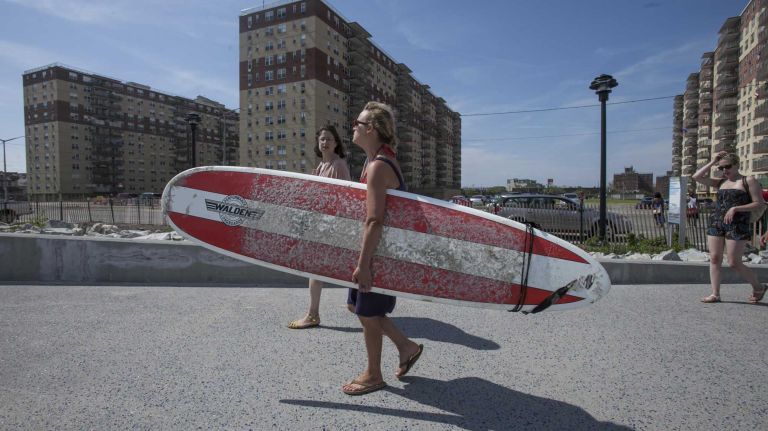 Surfing is growing in popularity at Rockaway Beach. 