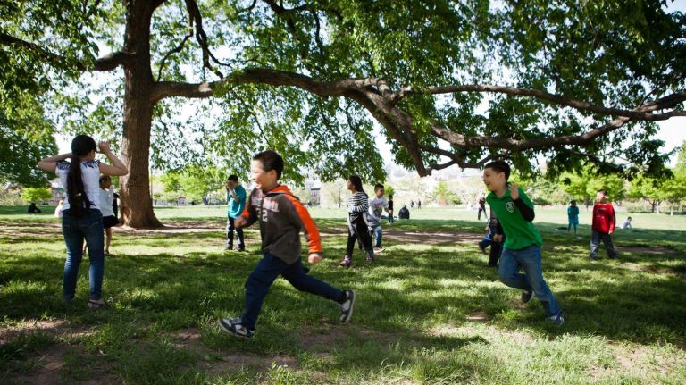 Children play in Sunset Park. 