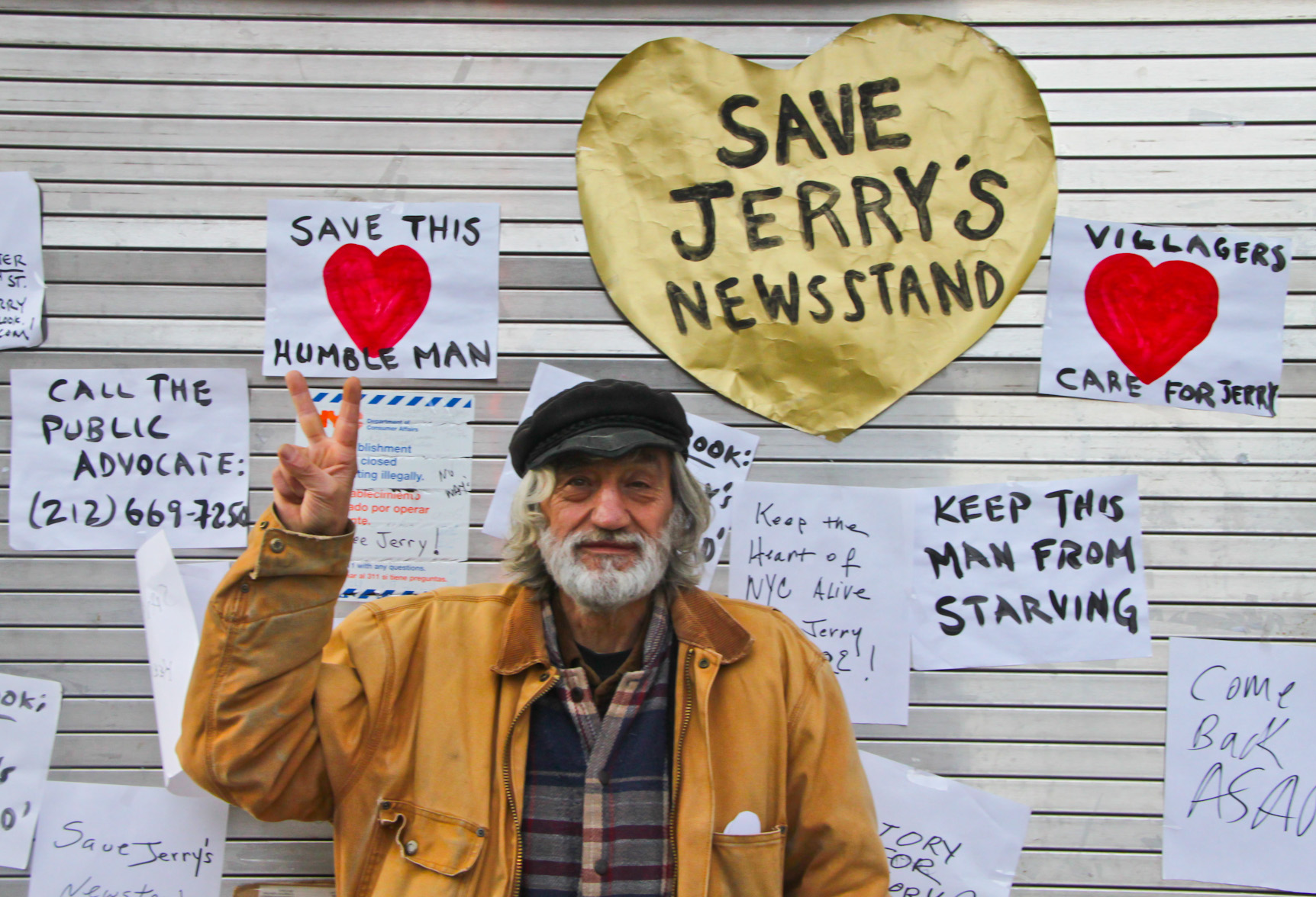 Extra! Extra! Astor Place vendor to return to newsstand 2 Victory! Jerry Delakas at his Astor Place newsstand at Monday's press conference announcing the news that he reached an agreement with the city allowing him to reopen the stand. Photo by Tequila MInsky