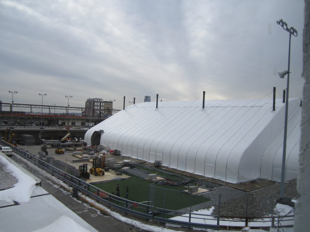 Pier 40 has been really “Suped”-up with a  giant white tent and a mini football gridiron on its roof for Super Bowl super-parties and broadcasting. Most of the action there will be happening Saturday. Photos by Pasha Farmanara