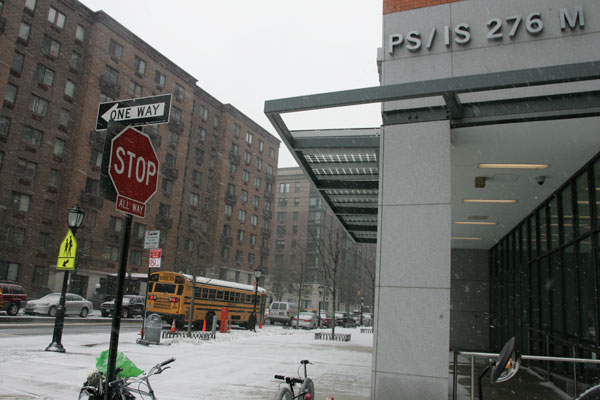 Stop and go on B.P.C. traffic safety issues 1 Downtown Express photos by Sam Spokony This stop sign was recently installed near P.S./I.S. 276 after a crossing guard was hit by a cab, but the city has denied another request to allow more students to use bus service.