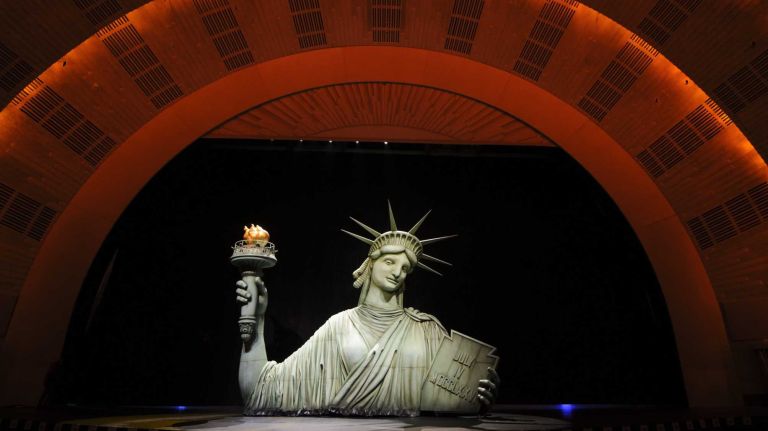 Lady Liberty, a 26-foot tall animatronic Statue of Liberty puppet, is operated onstage at Radio City on Feb. 18, 2014.