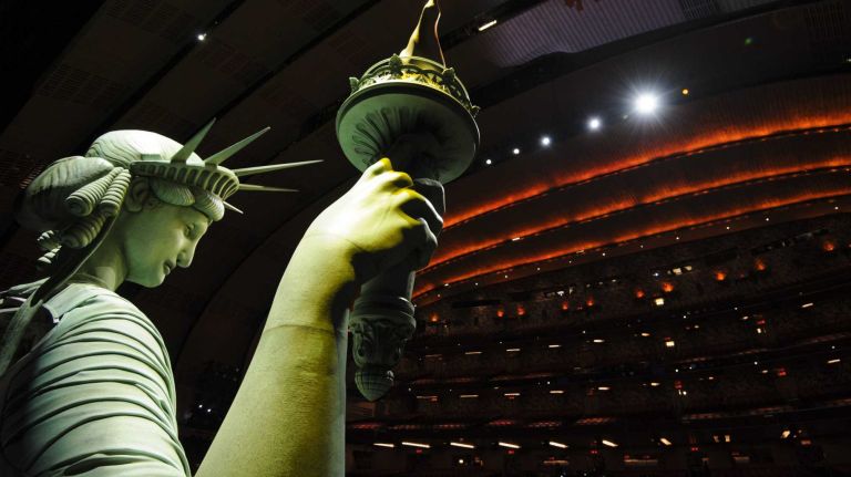 Lady Liberty, a 26-foot tall animatronic Statue of Liberty puppet, is operated onstage at Radio City on Feb. 18, 2014.