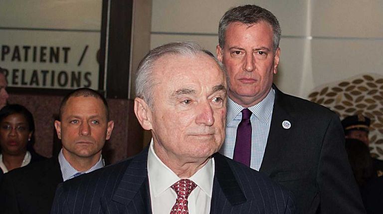 New York Police Commissioner William Bratton and Mayor Bill de Blasio at Kings County Hospital in Brooklyn  on Wednesday Feb. 25, 2014. 