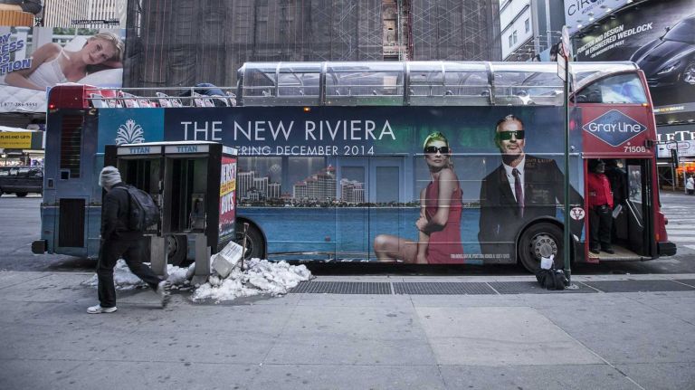 Would you really want to sit on the open-air top of one of these? The empty second level of this Grey Line tour bus, photographed on February 7, 2014, is one of the casualties of the cold weather, which have caused some of the city's attractions to lose business. 