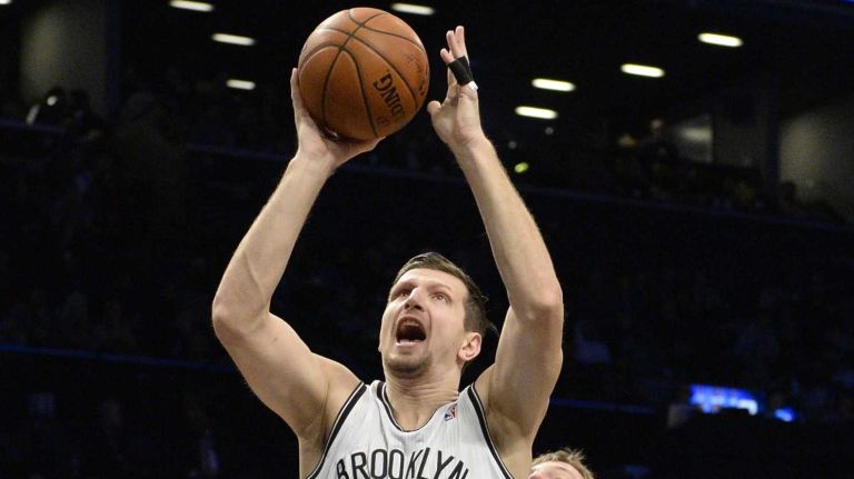 Teletovic makes most of increased minutes for Nets 2 Nets forward Mirza Teletovic scores from under the basket against Charlotte Bobcats forward/center Cody Zeller during the first half of an NBA basketball game at Barclays Center on Wednesday, Feb. 12, 2014.
