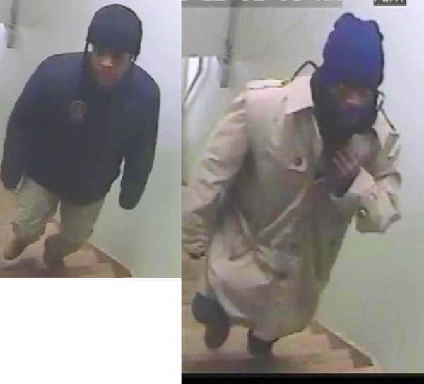 A surveillance camera photo of the alleged elevator robbers.