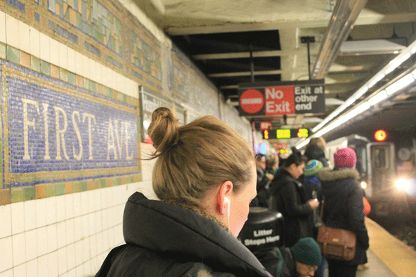 With only one exit at its western end, the First Ave. L station is often massively congested.  Photos by Zach Williams 