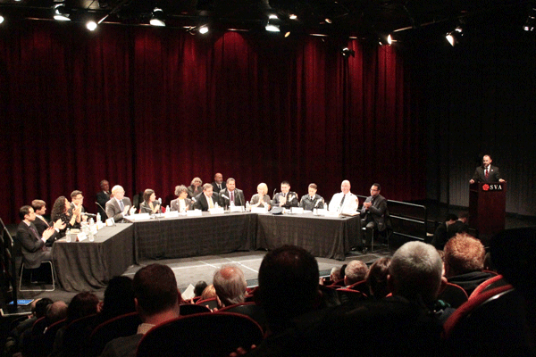 Photo by Zach Williams City Councilmember Corey Johnson (right, at podium) moderated, as a panel of city officials address local concern. 