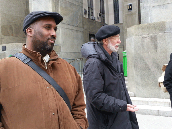 After leaving court on March 19, Stan Williams, a Cecily McMillan supporter, left, and McMillan’s attorney, Martin Stolar, discussed the case.