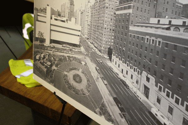 In the former seamen’s union conference room on the HealthPlex’s sixth floor was a blown-up, black-and-white photo, circa 1960s or ’70s, showing the former O'Toole Building, top, and how the “St. Vincent’s Triangle” garden looked back then. The latter was previously home to a movie theater. Plans are now to transform it into a combination public park and AIDS memorial.  Photo by Lincoln Anderson