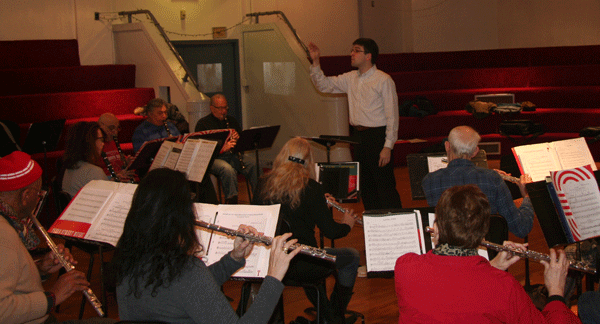 Photo by Michael Lydon Brandon Tesh, standing, directs the New Horizons band.