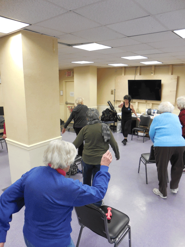 Photo by Scott Stiffler Music and motion (and some boxing moves), at the Fitness with Ivy class.