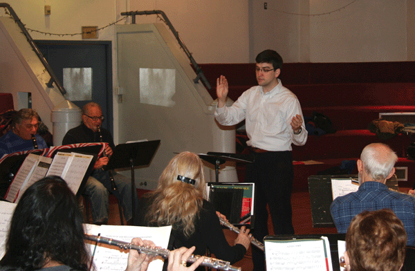 Photo by Michael Lydon Brandon Tesh, standing, directs the New Horizons band