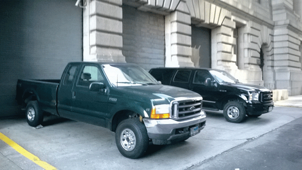 Feds take action against parking scofflaws after Express inquiry 1 Downtown Express photo by Nicolas Fernandes These vehicles were still blocking the sidewalk March 18 before Downtown Express called to find out why.