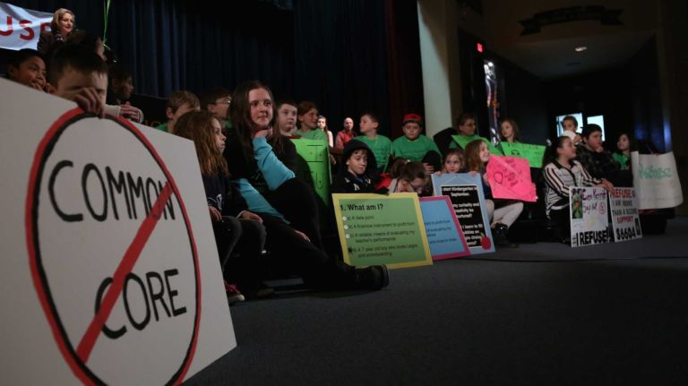 Kids hold up signs during the first New York rally in 