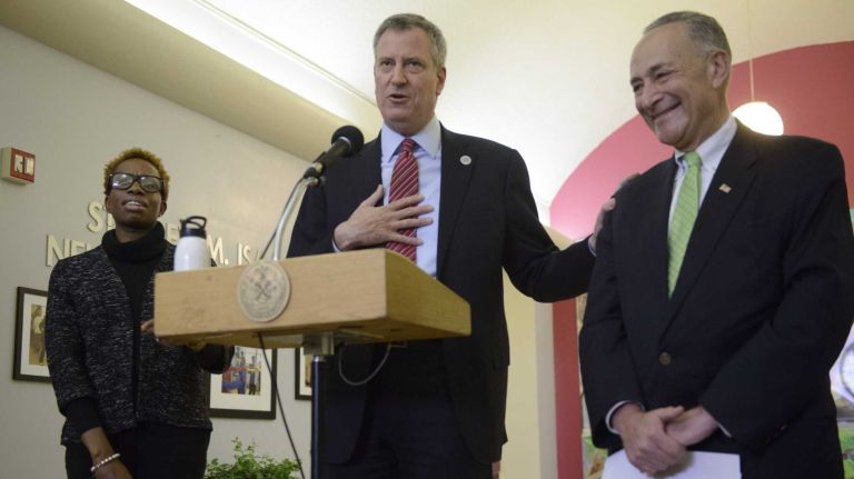 New York City Housing Authority chair Shola Olatoye, New York City Mayor Bill de Blasio and U.S. Senator Charles E. Schumer announce that residents currently living in NYCHA buildings that have temporary boiler systems due to damage from Superstorm Sandy, will be receiving new boilers in their building paid for by FEMA, during a press conference on Sunday, March 23, 2014.  