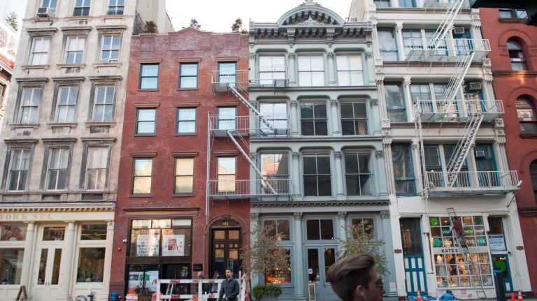 Expensive real estate, like these buildings in SoHo, contributes to NYC's expensiveness. 