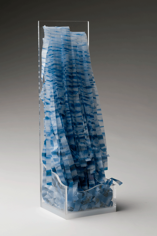 Katherine D. Crone’s “Overflow” (16" tall x 5" x5", acrylic plastic, pigment print on Usuyo Gampi, nylon microfilament) is part of the “Looking Beyond” group photography show (through April 10, at Carter Burden Gallery).  COURTESY OF THE ARTIST & CARTER BURDEN GALLERY