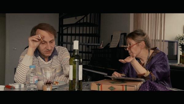 © LES Films Du Worso French novelist Michel Houellebecq gets a home-cooked meal, from the mother of his bumbling captors. 
