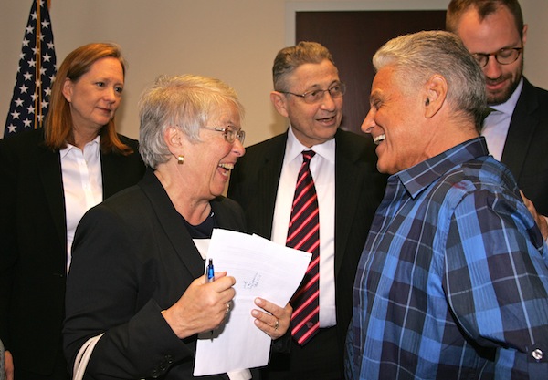 Schools Chancellor Carmen Fariña, left shared a laugh with Community Board 1's Paul Hovitz before last Thursday's meeting on Lower Manhattan schools, but the Downtown advocates were hoping for some answers from Fariña. Behind them were Catherine McVay Hughes, C.B. 1's chairperson and Assembly Speaker Sheldon Silver. Downtown Express photo by Sam Spokony.