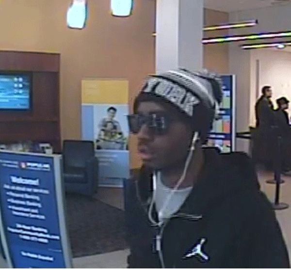 A surveillance image of the serial bank-robbing suspect, according to police.