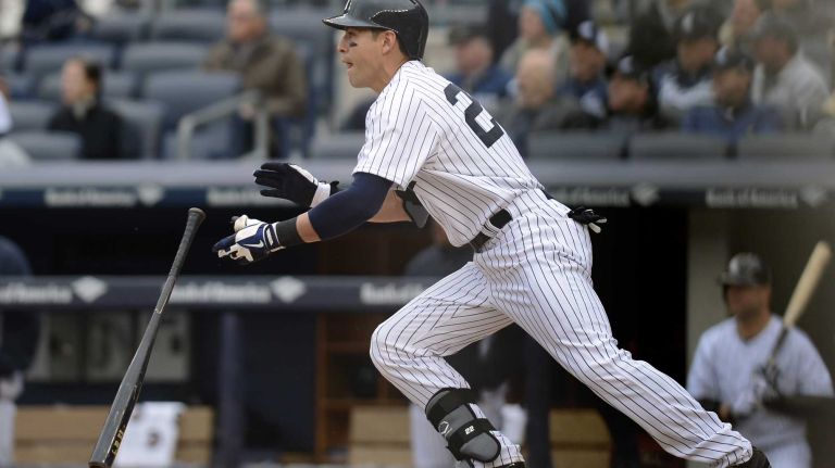 New York Yankees Jacoby Ellsbury knocks an RBI in the 5th inning of his home opener against the Baltimore Orioles at Yankee Stadium on April 7, 2014.