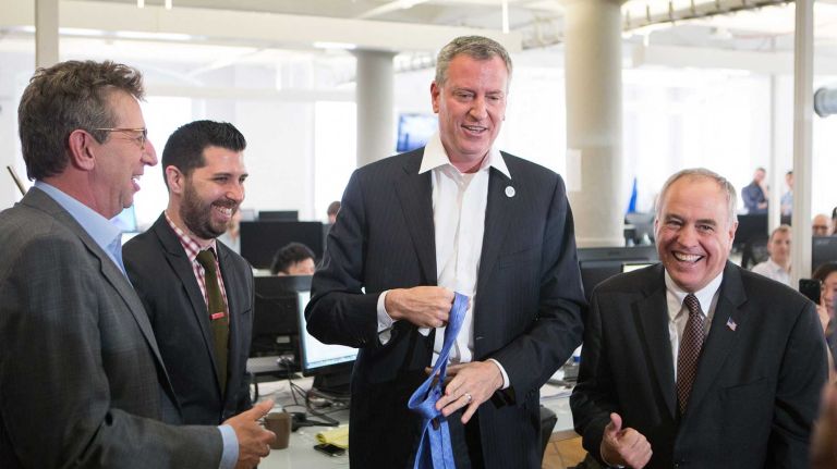 Bill de Blasio policies will cut number of entry jobs 2 Mayor Bill de Blasio at the offices of Bounce Exchange, a tech company, after a press conference with New York State Comptroller Thomas P. DiNapoli (right).